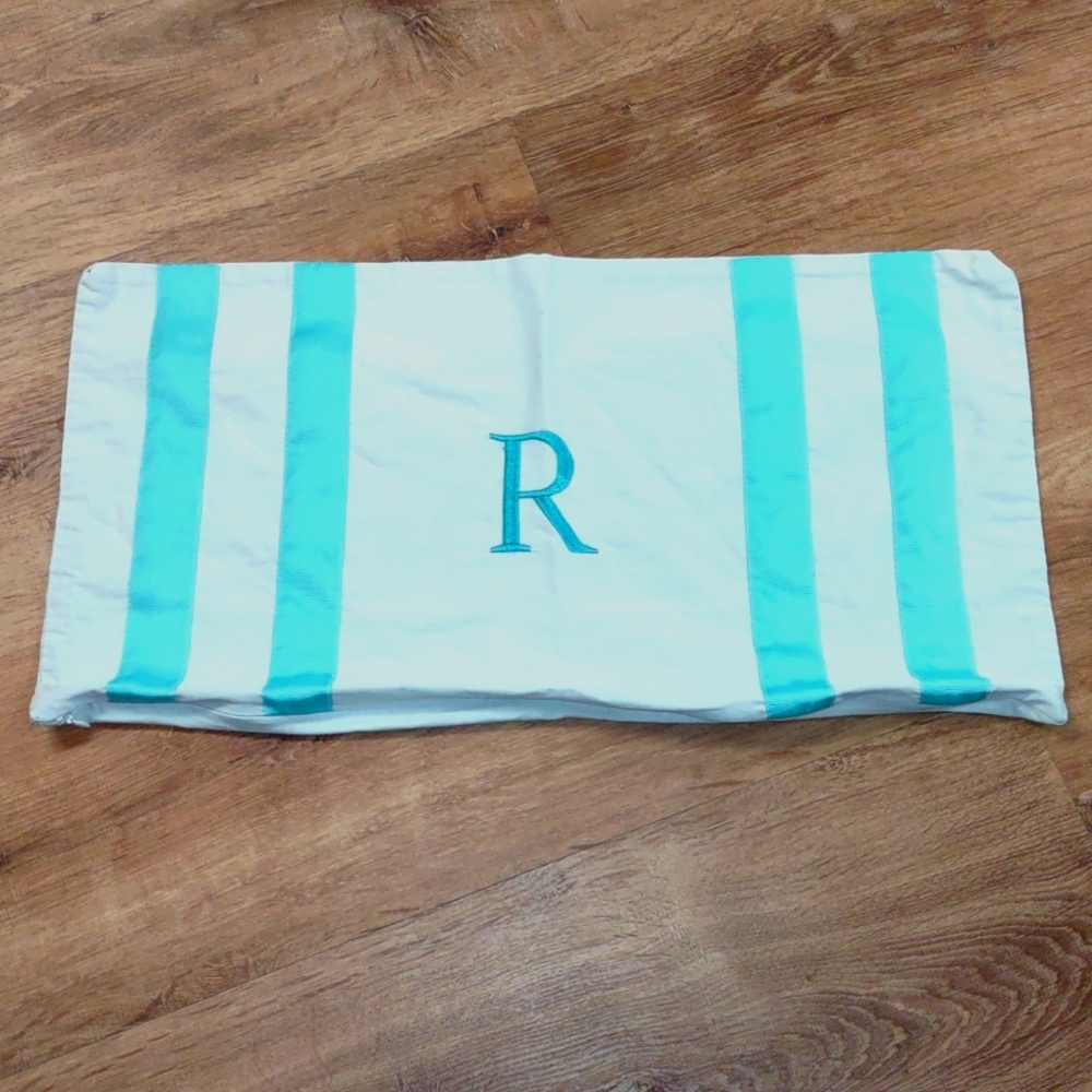 Zippered pillow cover with grosgrain ribbon trim